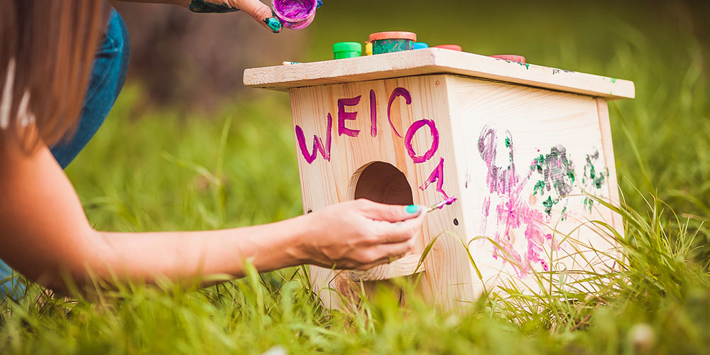 Pine Hills Nursery-Mississippi - Attract Birds to Your Yard With the Kids -child decorating bird house